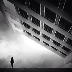 People walking in front of modern building