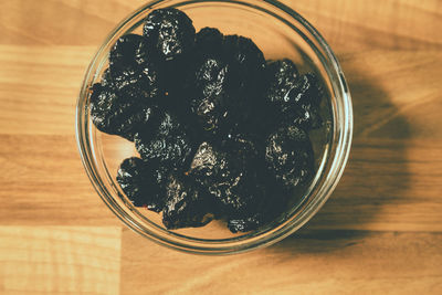 High angle view of fruits in glass jar on table