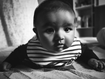 Portrait of cute baby at home