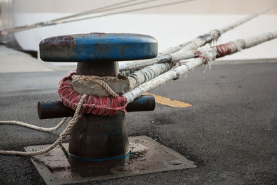 Close-up of mooring bollard