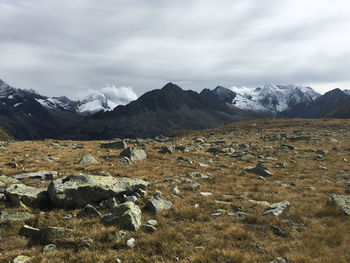 Scenic view of landscape and mountains against sky