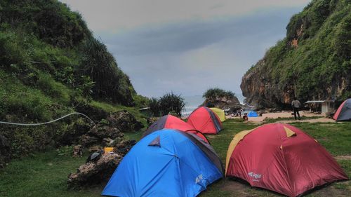 View of tent on mountain against sky