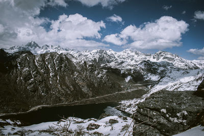 Scenic view of snowcapped mountains against sky