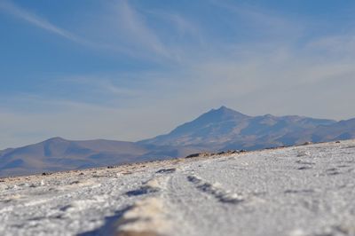 Mountain range against blue sky