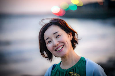 Portrait of smiling young woman