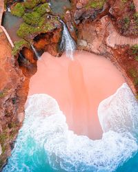 High angle view of rock formation in sea