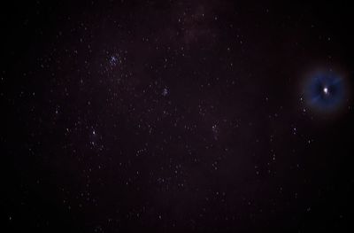 Low angle view of star field against sky at night