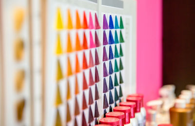 Close-up of multi colored pencils in row