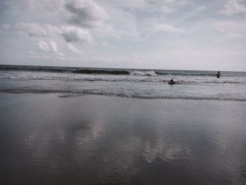 Scenic view of beach against sky