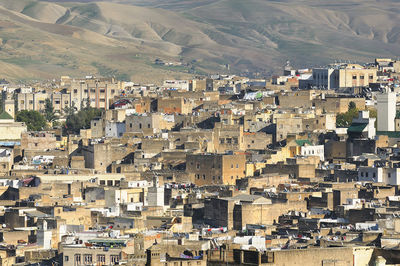 High angle view of houses in city