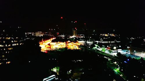 Illuminated cityscape at night