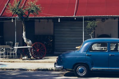 Vintage car against cloudy sky