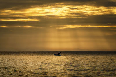Dramatic sky over sea during sunset