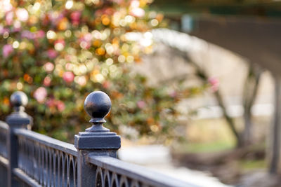 Close-up of railing against blurred background