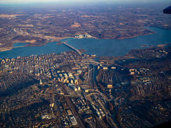 High angle view of city by sea