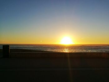 View of calm sea at sunset