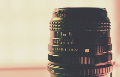 Close-up of camera against white background