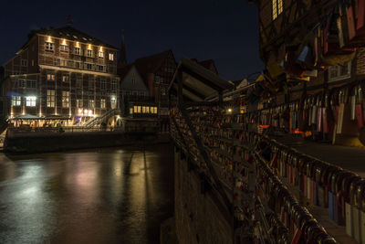 Illuminated buildings in city at night