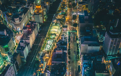 High angle view of illuminated cityscape at night