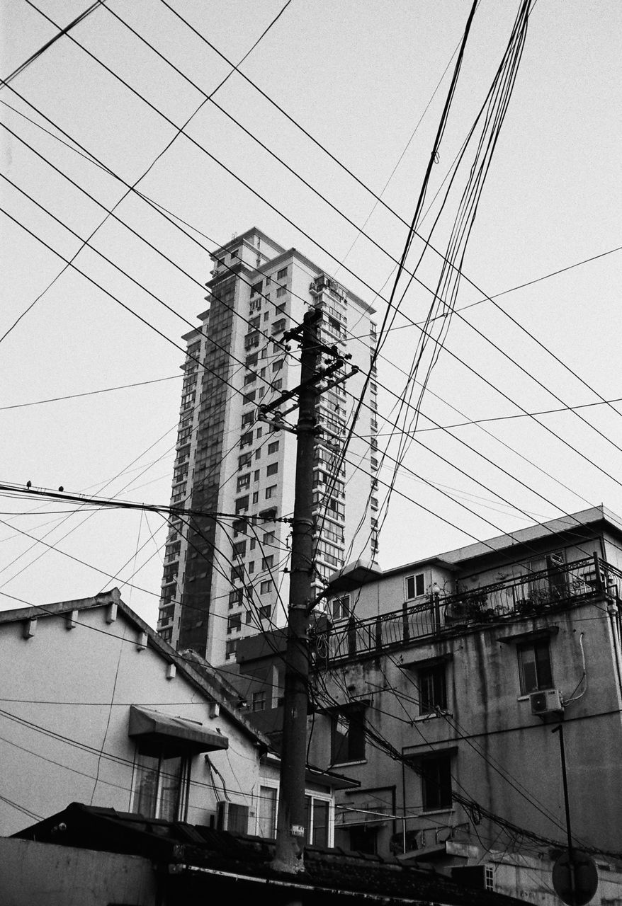 LOW ANGLE VIEW OF BUILDINGS AGAINST SKY