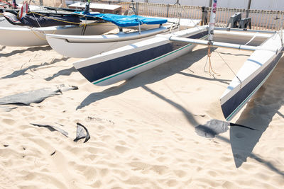 High angle view of boats moored on beach