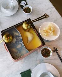 High angle view of fruits in plate on table