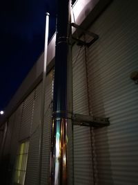 Low angle view of illuminated building at night