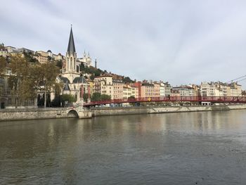 The saint-georges roman catholic church, the paul couturier bridge and the quays of the saône river