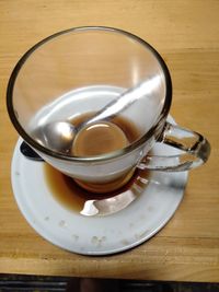 High angle view of coffee cup on table