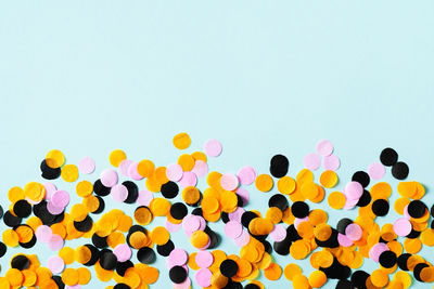 Multi colored balloons against blue sky