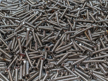 Huge of small stainless steel self-tapping screws. construction equipment. consumables.