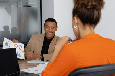 Business colleagues working at office