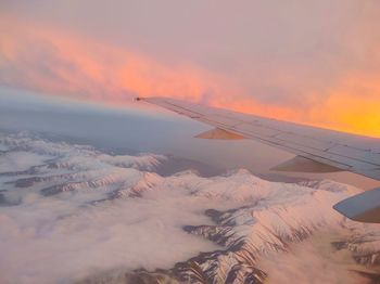 Aerial view of mountain against sky during sunset