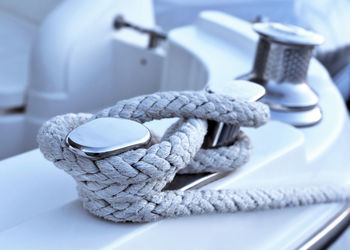 Close-up of rope tied on nautical vessel