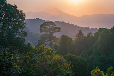 Scenic view of mountains against sky during sunset