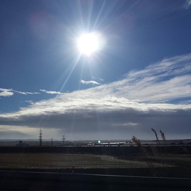 sun, sunbeam, sky, sunlight, lens flare, bright, tranquility, landscape, nature, cloud - sky, sunny, tranquil scene, beauty in nature, scenics, cloud, field, day, blue, outdoors, no people