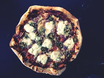 Close-up of food over black background