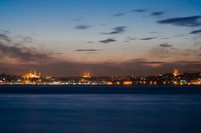 Illuminated cityscape at night