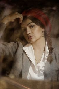 Portrait of young woman looking away