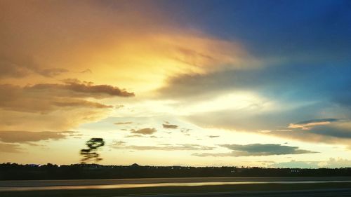 Scenic view of landscape at sunset