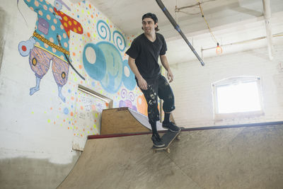 Young male at skating rink.