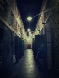 Empty walkway at night