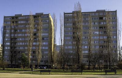 View of apartment buildings against clear sky