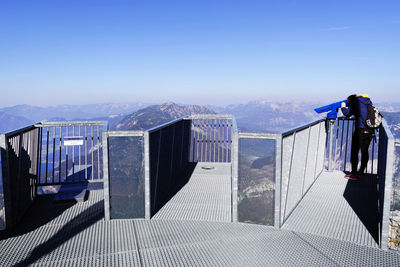 Panoramic view of buildings against blue sky