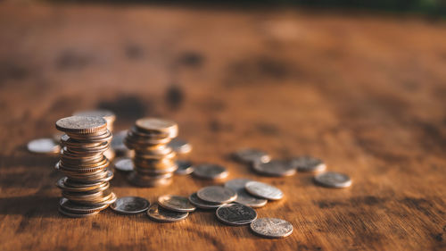 Close-up of coins on table