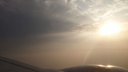 Sun shining through clouds