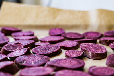 Close-up of chopped sweet potato on cutting board 