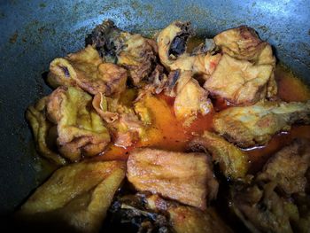 High angle view of meat in cooking pan