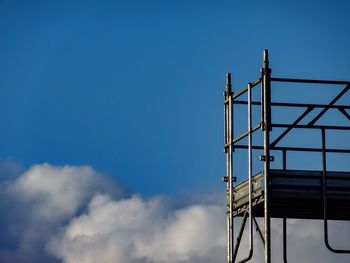 Low angle view of built structure against blue sky