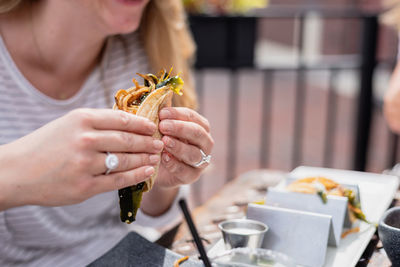 Close-up of woman holding ice cream